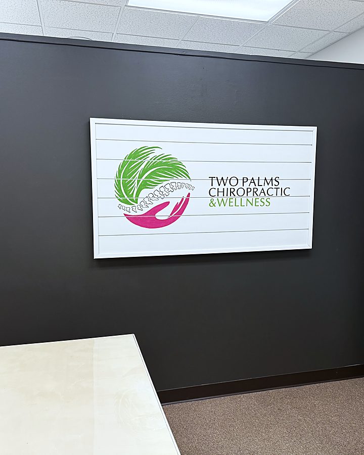 Two Palms reception desk and welcome wall